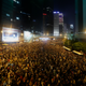 Tens of thousands of protesters block the main street to the Central financial district outside the government headquarters in Hong Kong, Sept. 28, 2014.